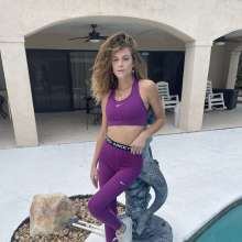 WetlookFashion: Natalie takes a bath in her Nike Pro workout set