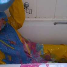 Thefetishgirl: Colourful Rainwear Mess