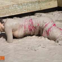 FOXY: Stellis in evening dress in mud
