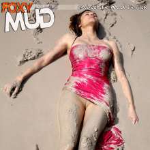 FOXY: Stellis in evening dress in mud