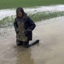 Wamgirlx: Muddy Fields, Rainsuit in the Rain