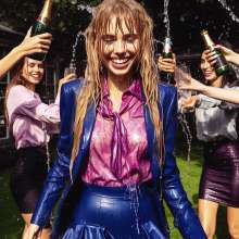 Wetmaxiskirts: AI wetlook: women in business suits (third selection)