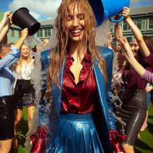 Wetmaxiskirts: AI wetlook: women in business suits (third selection)