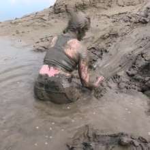 DungeonMasterOne: Miss Abigail Drenched in Mud in Shiny Leggings