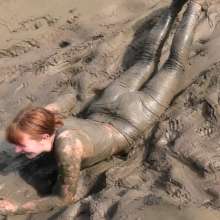 DungeonMasterOne: Miss Abigail Drenched in Mud in Shiny Leggings