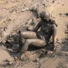 DungeonMasterOne: Miss Abigail Drenched in Mud in Shiny Leggings