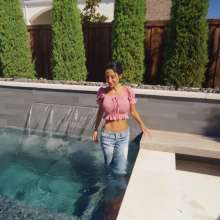 WetlookFashion: Sexy Charlie Does Some Pool Dipping in Jeans and Crop Top