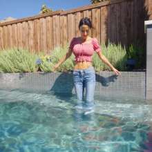 WetlookFashion: Sexy Charlie Does Some Pool Dipping in Jeans and Crop Top