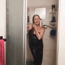 Thefetishgirl: Sexy Leather Dress Shower