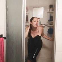 Thefetishgirl: Sexy Leather Dress Shower