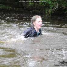 DungeonMasterOne: Purity goes swimming in a tight black ladies running outfit