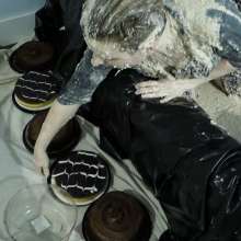 Stella: Stella continues trashing a dress with oatmeal and cake.