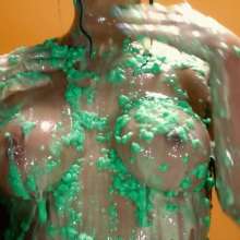 GirlsGetGunged: Booby brunette gets into a sexy and sticky mess