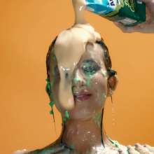 GirlsGetGunged: Booby brunette gets into a sexy and sticky mess