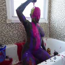 Stella: Stella paints her body with different bright colors with a twist.
