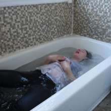 Stella: Stella get's blouse soaking wet in the shower.