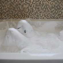 Stella: Stella orgasms and gets stuck in a tub of fluffy white slime.