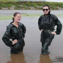 DungeonMasterOne: Honeysuckle and Lucia in the mud in green rainwear!