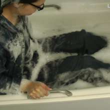 DungeonMasterOne: Daisy drenched in denim: Bubblebath and shower in denim overalls and jacket