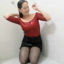 MadelineOasis: Lolita in a Black Skirt and Orange Top With No Bra