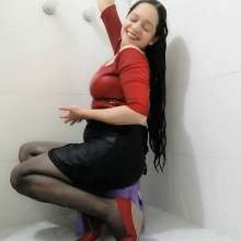 MadelineOasis: Lolita in a Black Skirt and Orange Top With No Bra