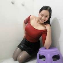MadelineOasis: Lolita in a Black Skirt and Orange Top With No Bra