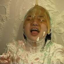 Alumi: Sexy Japanese girl pied in the face and slimed, showing her bare soles