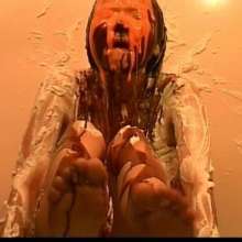 Alumi: Sexy Japanese girl pied in the face and slimed, showing her bare soles