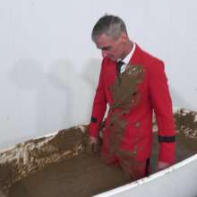 WamtasticUK: MessySte Red Suit Mud Bath