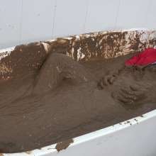 WamtasticUK: MessySte Red Suit Mud Bath