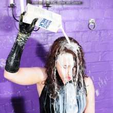 DungeonMasterOne: Lady Rose drenched in custard in a PVC catsuit and satin corset!
