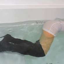 Tight and Wet Clothes: Bathtub in Tight White Dress and Boots