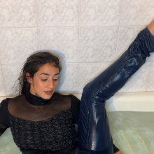 muddyfeet: Sexy woman wet in jeans in tub barefoot