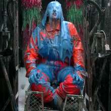 LiquidX: The Human Carwash: Michaela Orange Rainwear