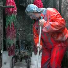 LiquidX: The Human Carwash: Michaela Orange Rainwear