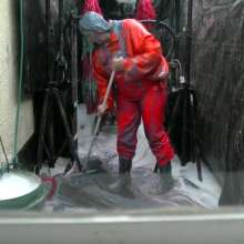 LiquidX: The Human Carwash: Michaela Orange Rainwear