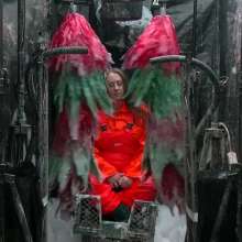 LiquidX: The Human Carwash: Michaela Orange Rainwear
