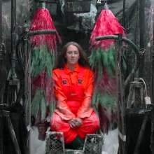 LiquidX: The Human Carwash: Michaela Orange Rainwear