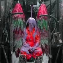 LiquidX: The Human Carwash: Michaela Orange Rainwear
