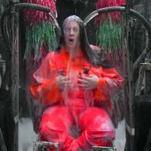 LiquidX: The Human Carwash: Michaela Orange Rainwear