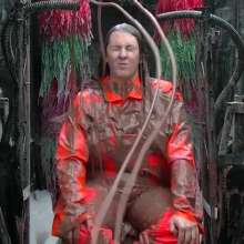 LiquidX: The Human Carwash: Michaela Orange Rainwear
