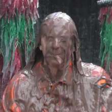 LiquidX: The Human Carwash: Michaela Orange Rainwear