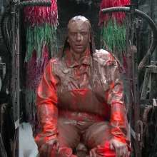 LiquidX: The Human Carwash: Michaela Orange Rainwear