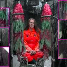 LiquidX: The Human Carwash: Michaela Orange Rainwear