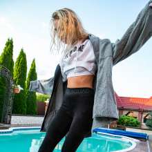 wet.look.me: Wetlook girl in leggings jumps into the water from a diving board