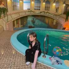 Wet Live Team: Alice Swims in a Tracksuit in the Pool, Relaxes