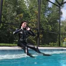 WetlookFashion: Lexie Swims in a PU Leather Jumpsuit