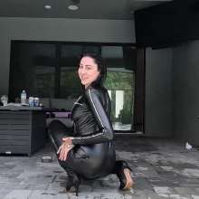 WetlookFashion: Lexie Swims in a PU Leather Jumpsuit