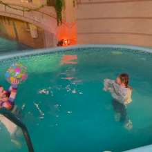 Wet Live Team: Two Girlfriends Getting Completely Wet Playing in the Pool