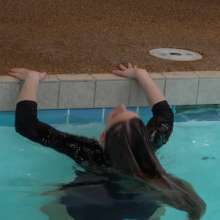 WildThang: Waitress in Black Uniform Serves Drinks Poolside